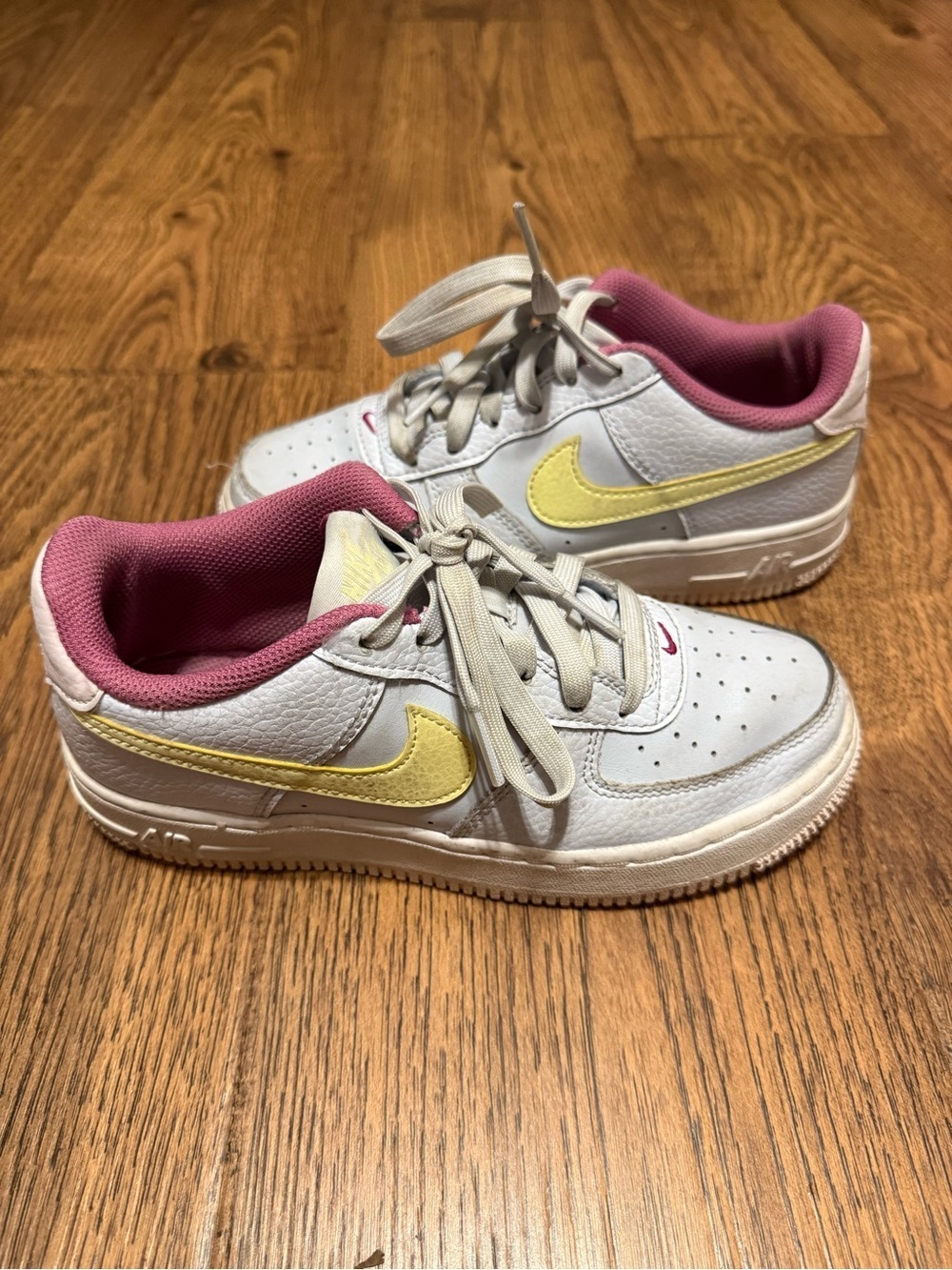 Nike Kids White Sneakers with Yellow Swoosh and Pink Lining